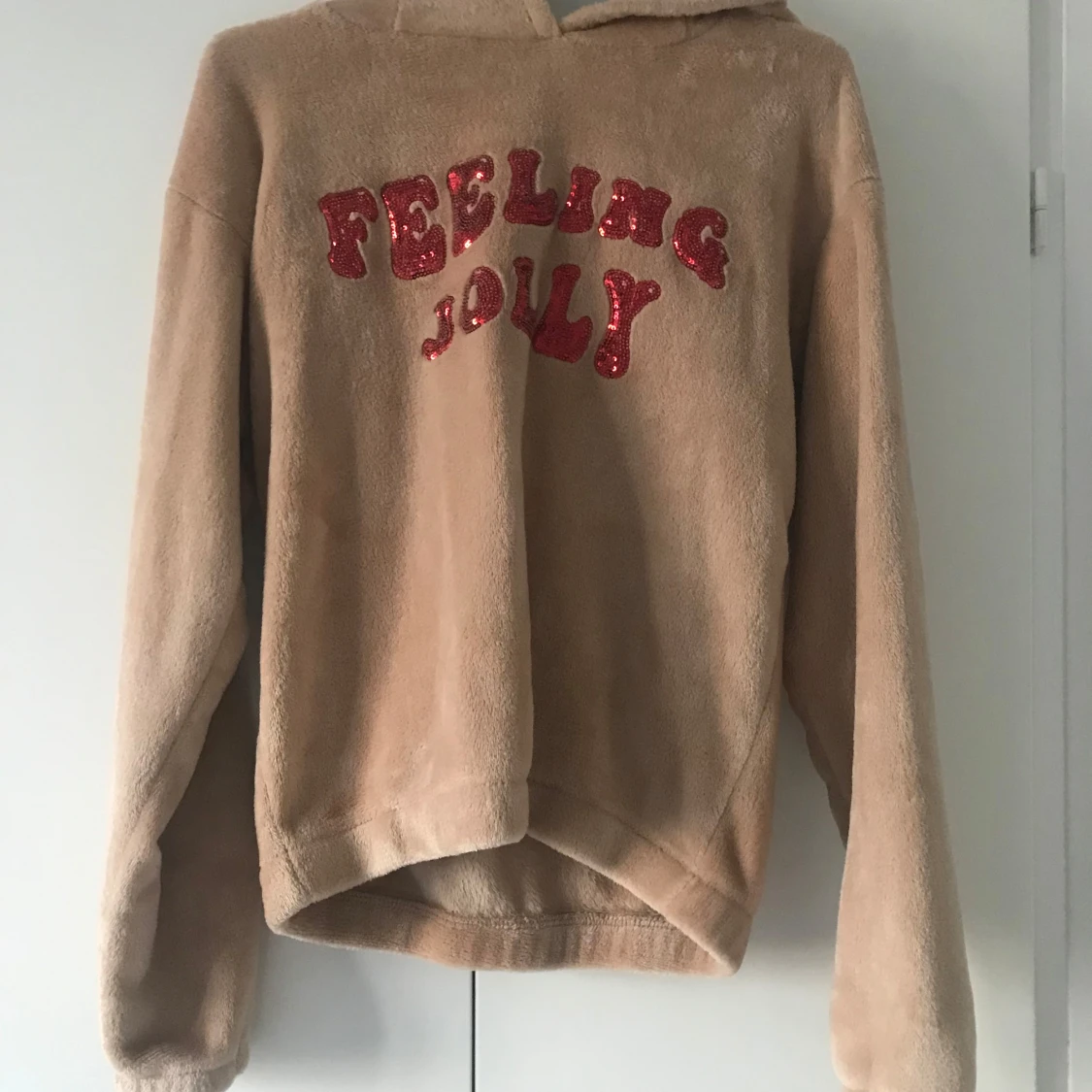 Beige hoodie från Kappahl