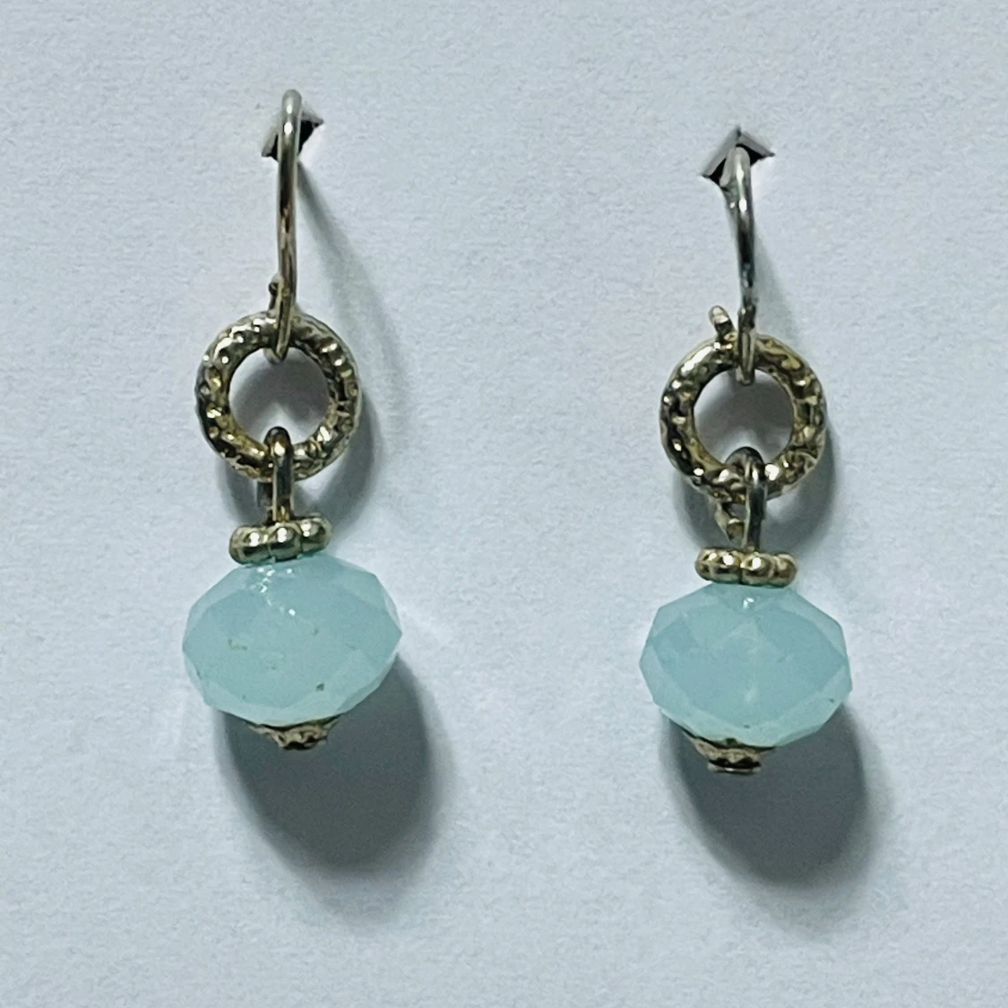 Earrings with light blue faceted glass beads