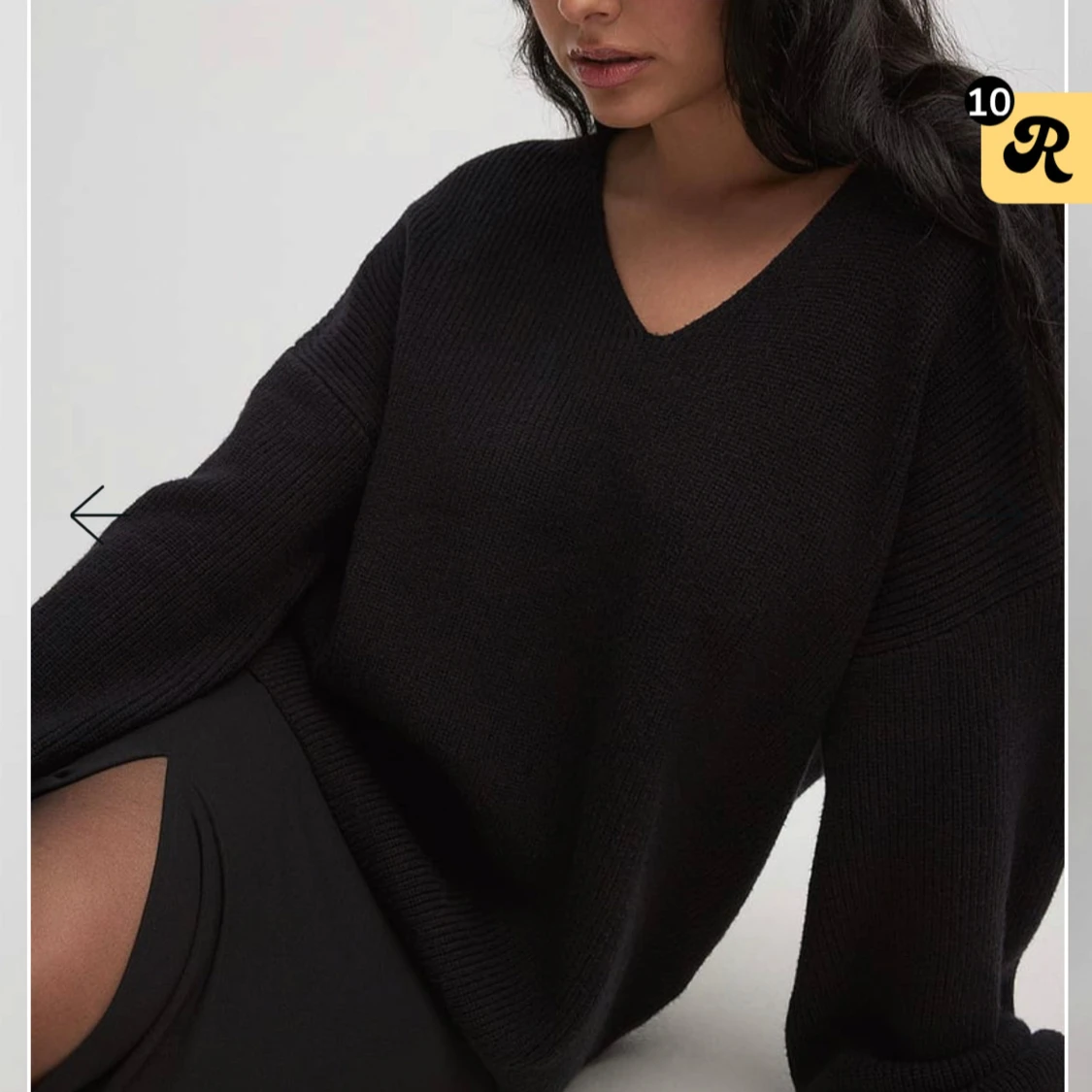 Svart stickad tröja från NA-KD med v ringing 