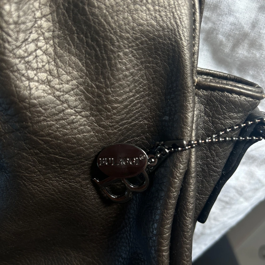 Brun/ guldig axelväska från Bulaggi  - 3