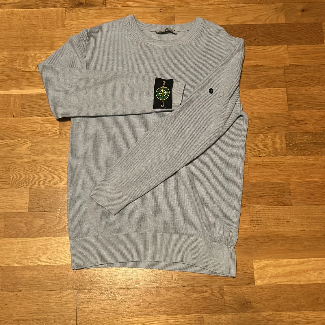 Ljusblå tröja från Stone Island