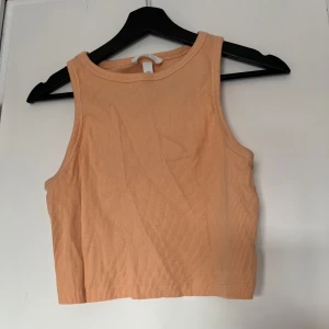 Linne - Oranget linne från H&M i storlek M.