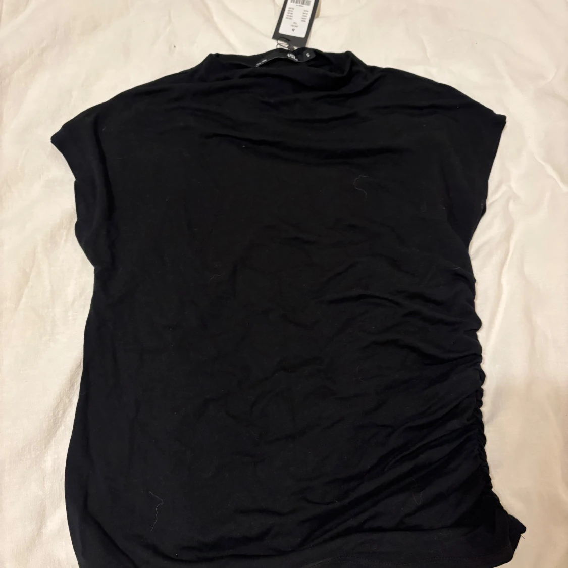 Svart kortärmad topp