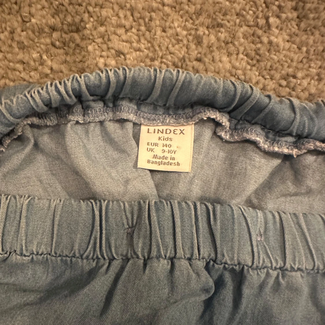 Blå volangkjol i jeans från Lindex - 3