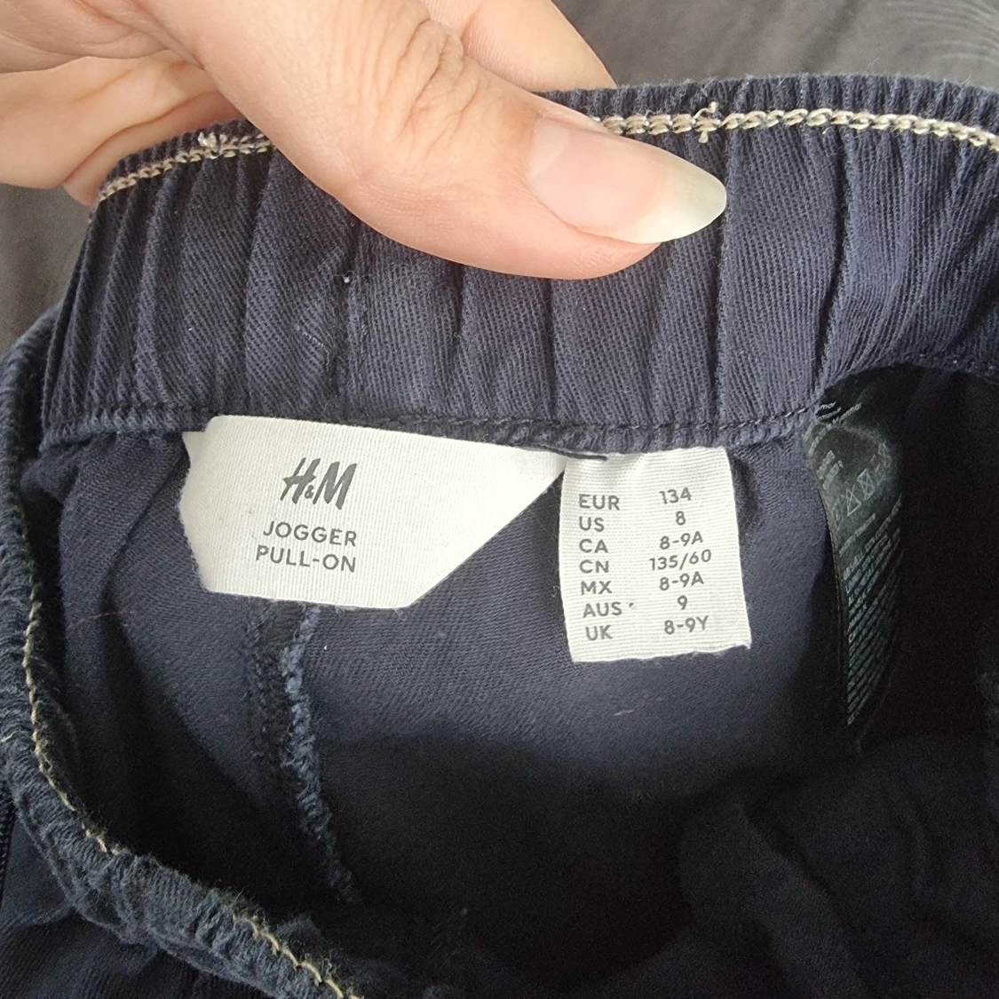 Mörkblå joggerbyxor från H&M - 1