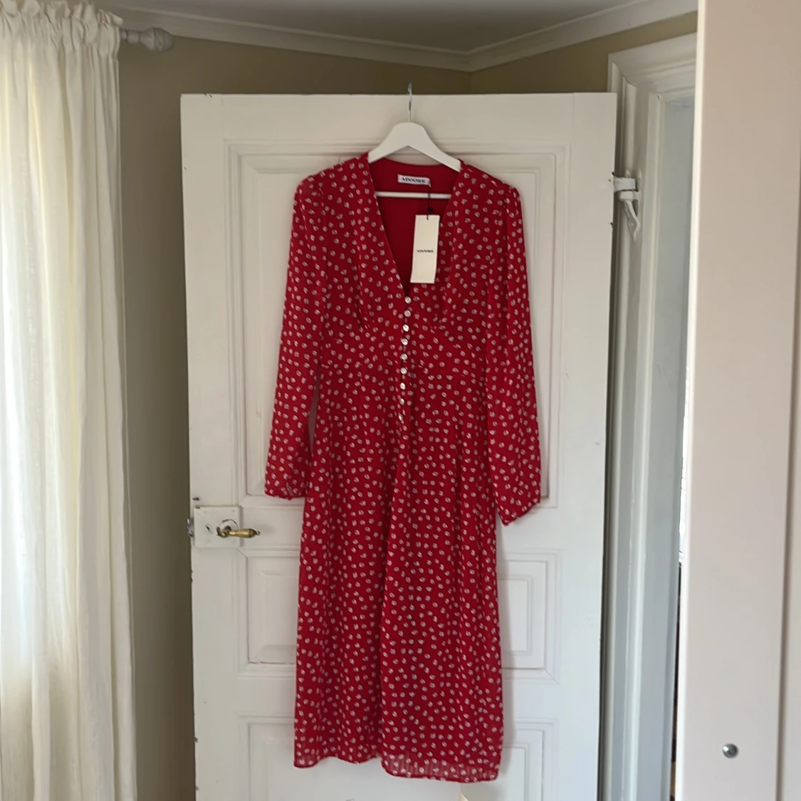 Röd blommig långklänning Adoore