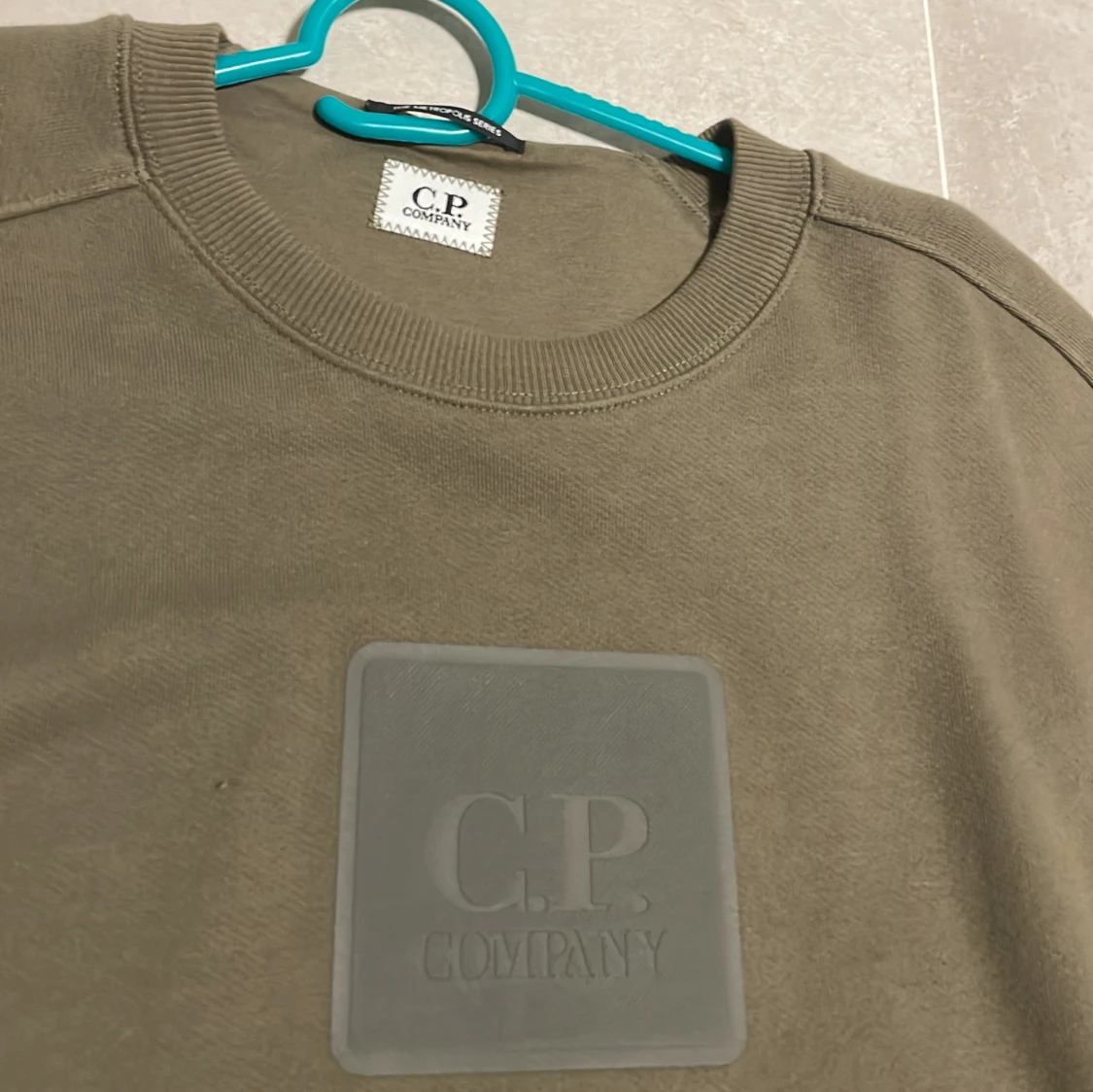 Olivgrön sweatshirt från C.P. Company