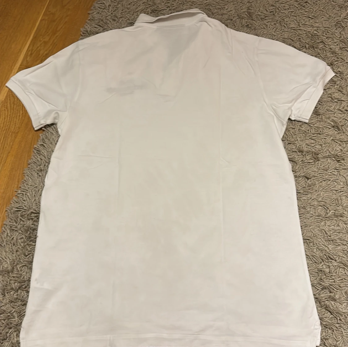 Vit pikétröja Peak Performance L - 1