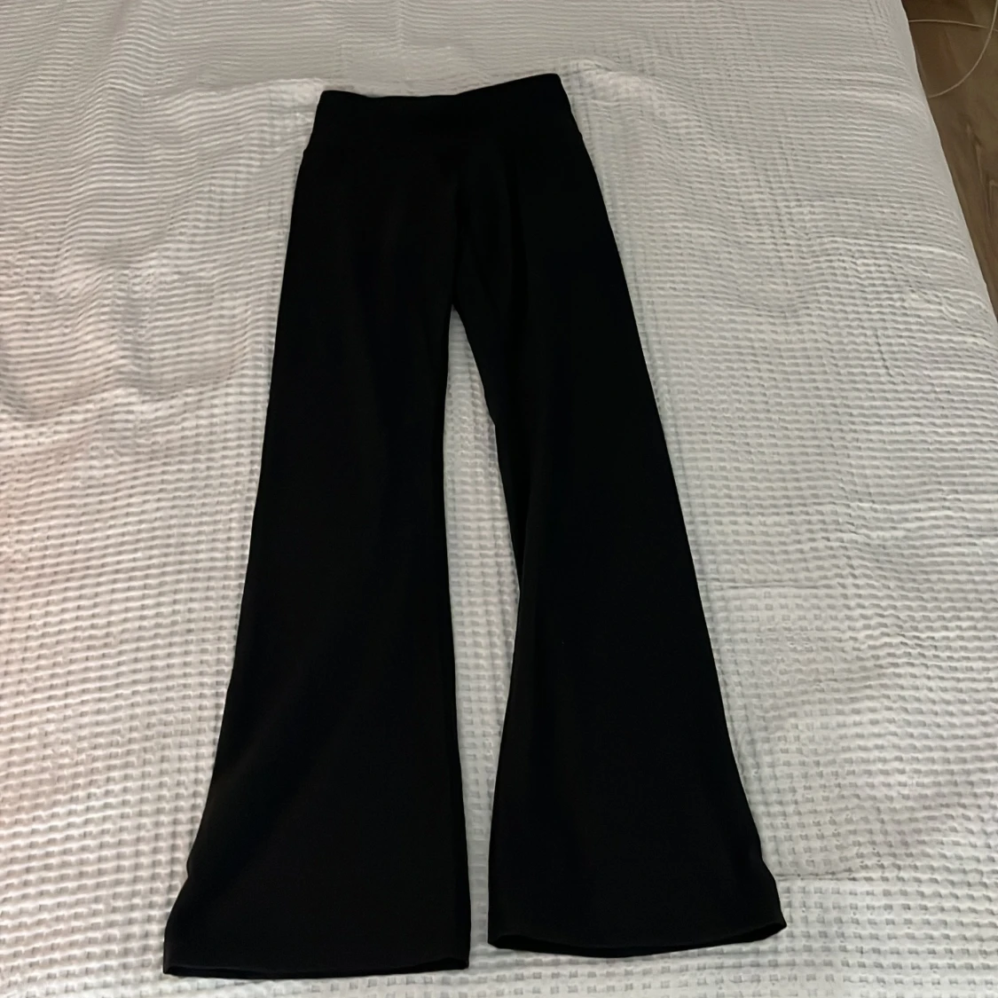 Svarta bootcut träningsbyxor Bounce XS