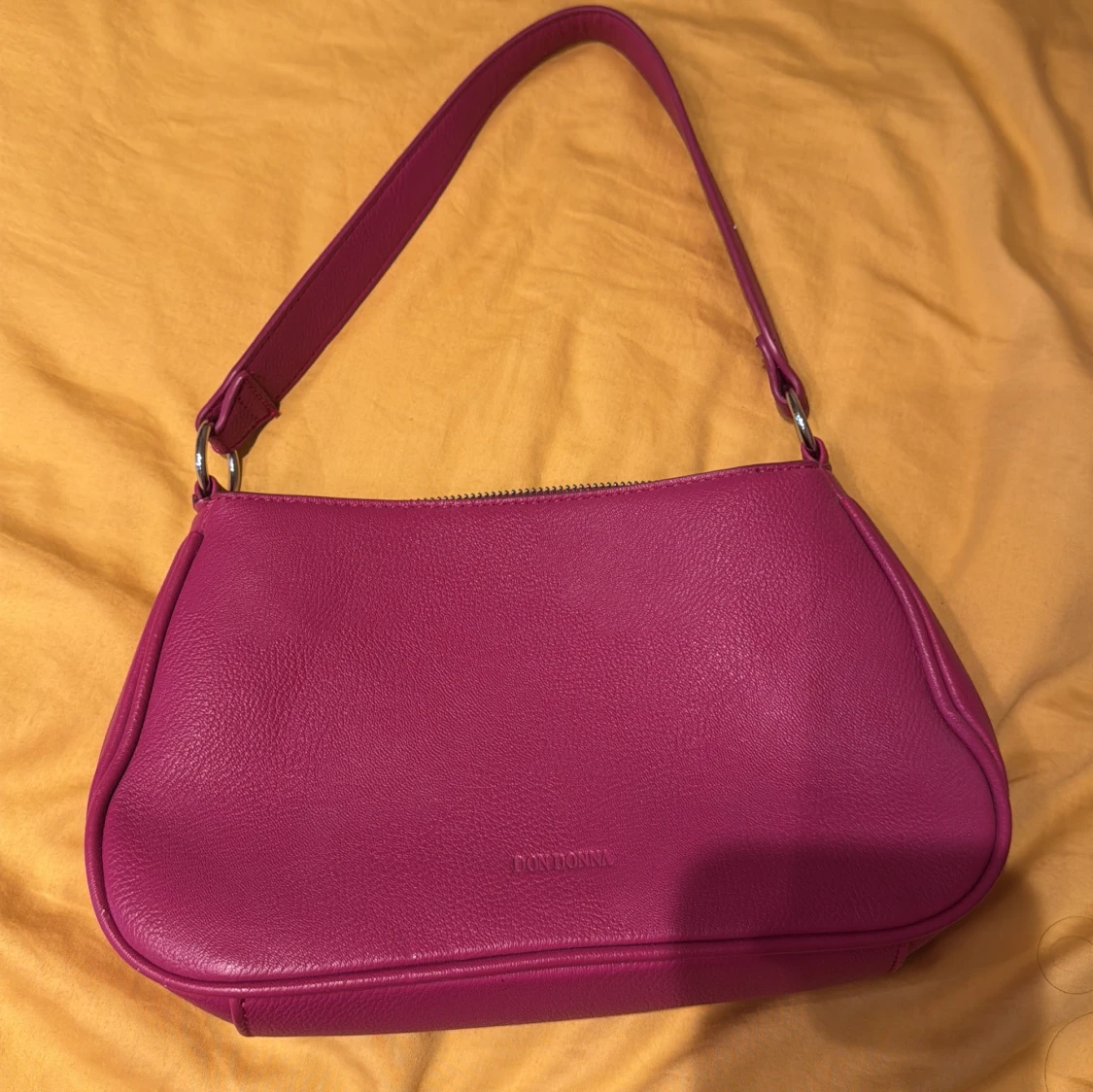 Rosa axelväska från Don Donna