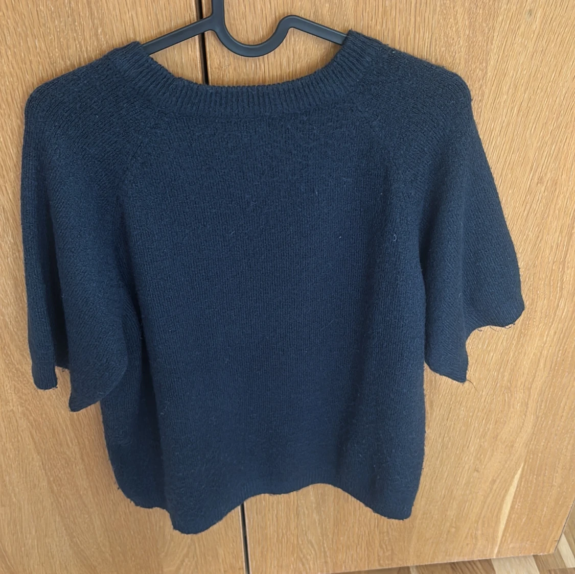 Mörkblå stickad tröja från 157 - 1