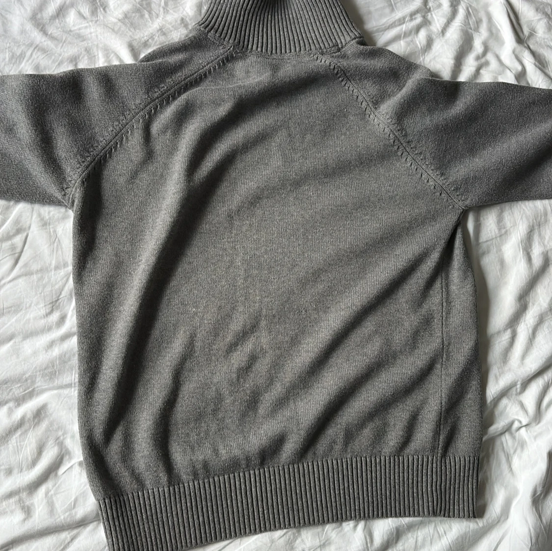 Grå stickad tröja Peak Performance - 1