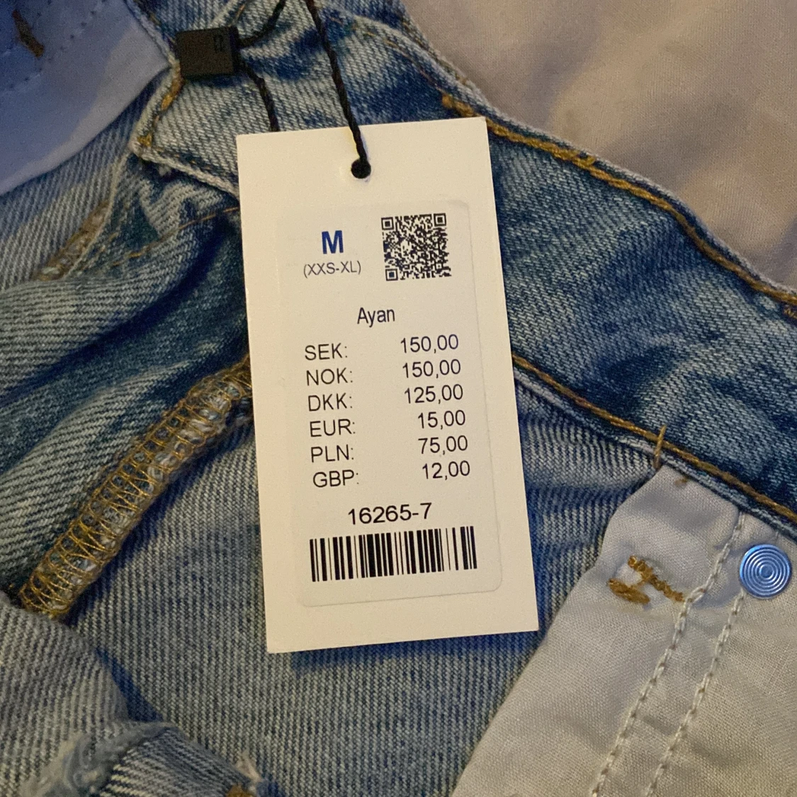 Blå jeansshorts med slitningar 157 - 2