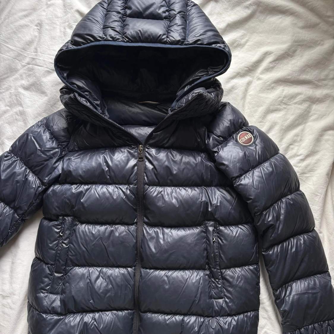 Mörkblå jacka från Colmar med huva