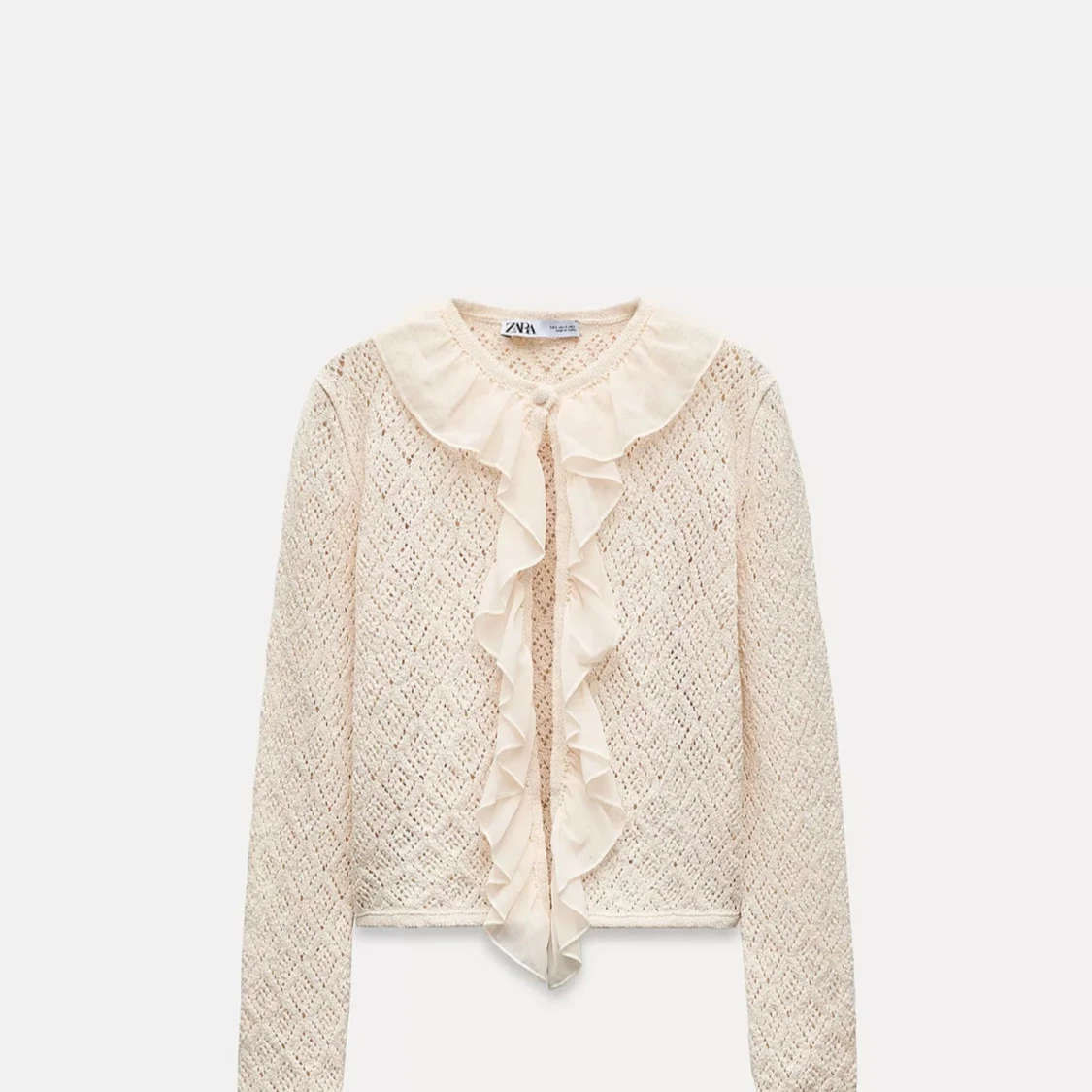 Beige stickad kofta med volang Zara