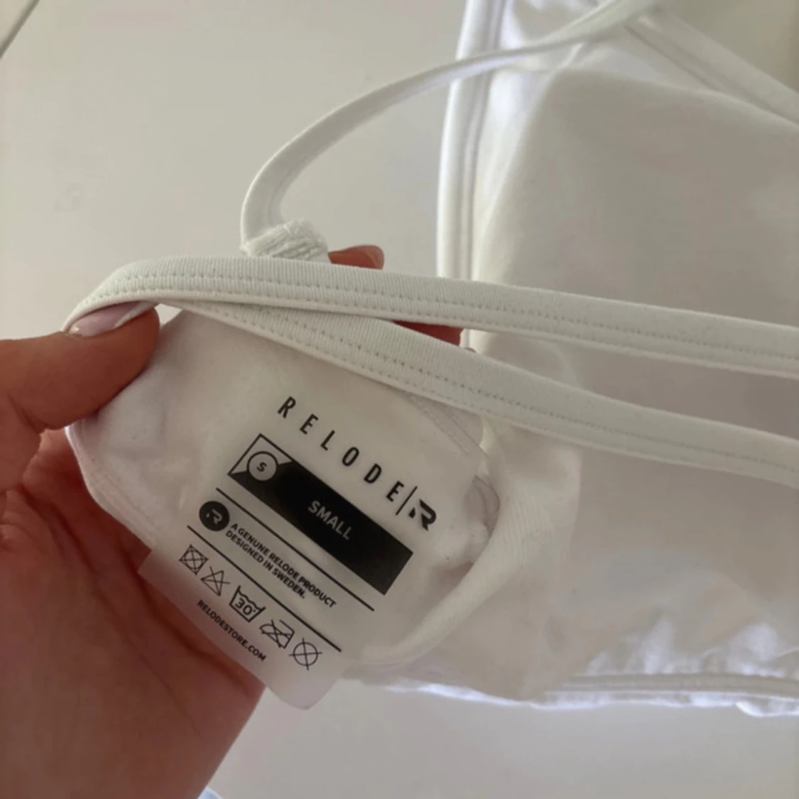 Vit linnetopp från Relode - 2