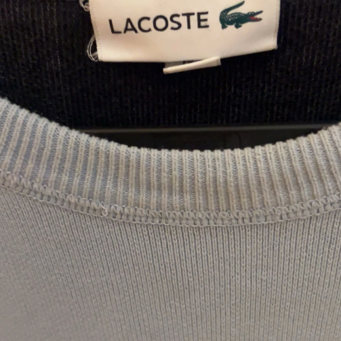 Ljusblå sweatshirt från Lacoste - 1