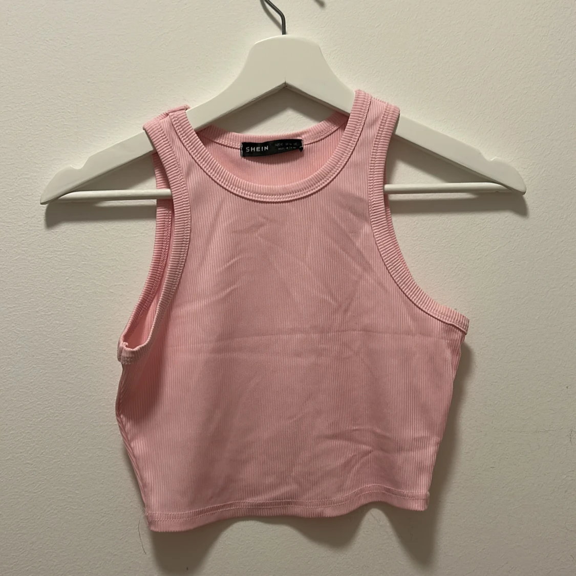 Rosa croppad linnetopp 