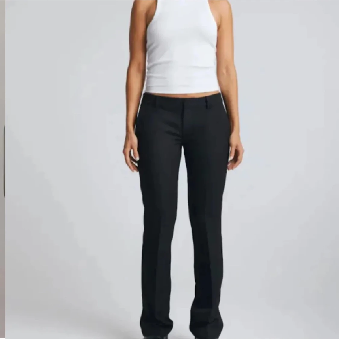 Svarta kostymbyxor