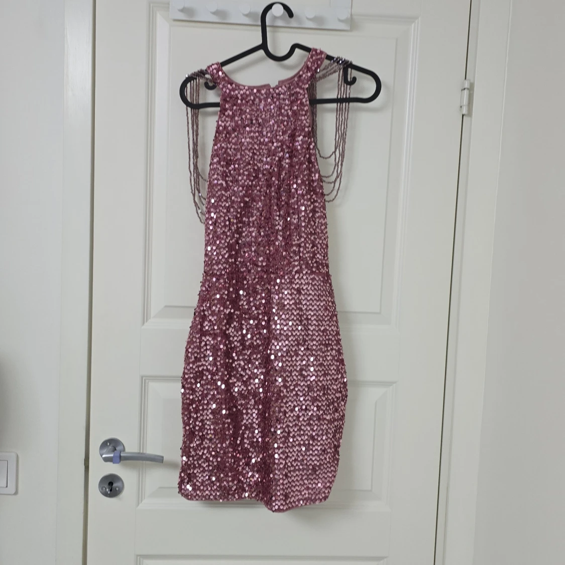 Rosa glittrig paljettklänning
