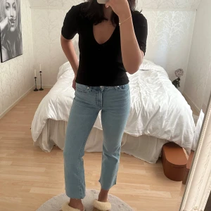 Jeans  - Croppade bootcut jeans från Mango