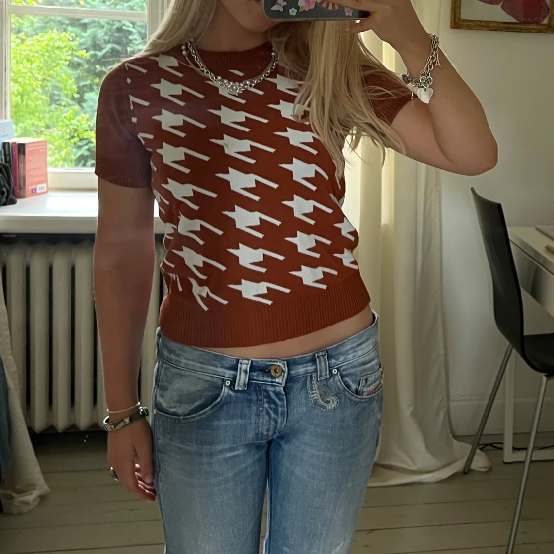 Stickad kortärmad tröja