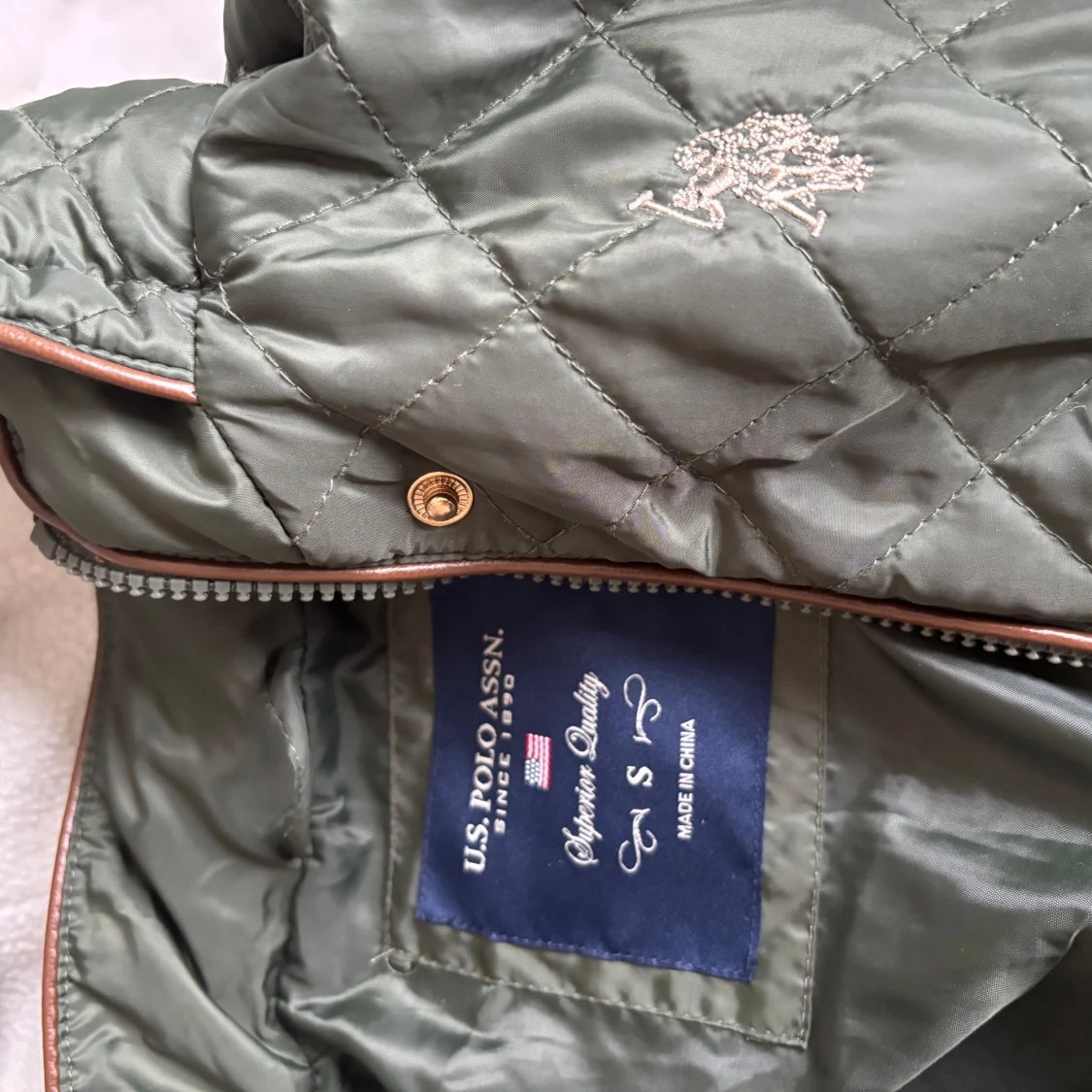 Quiltad grön jacka från U.S. Polo Assn. - 1