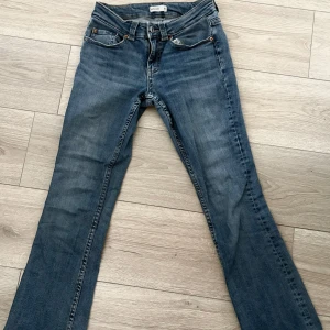 Low waist bootcut Jeans - -Storlek: 34 | Blå