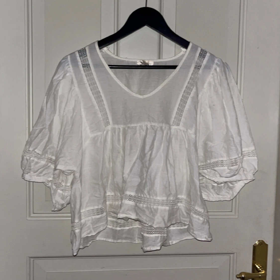 Vit blus från Angelology