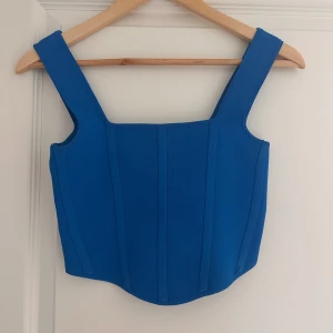 Blå croppad korsett-topp - Fin croppad topp, använd fåtal gånger ✨