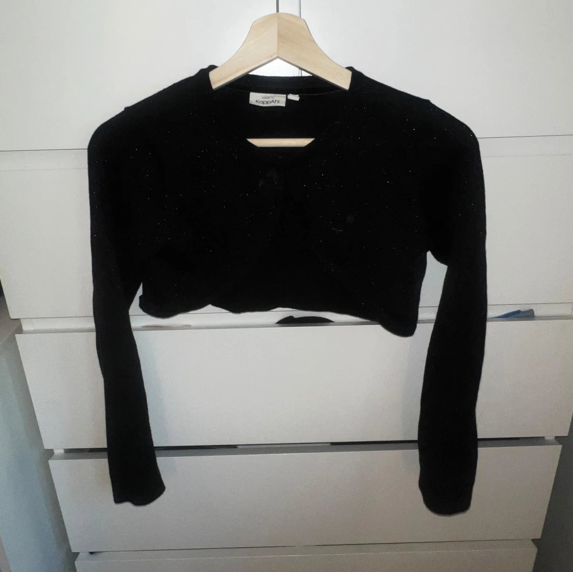 Svart glittrig kofta från KappAhl