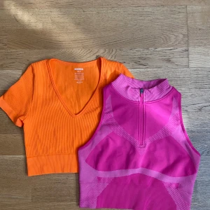 Croptopp & träningstopp - Superfräsch orange croptopp från BikBok med djup v-ringning och rosa träningstop med blixtlås från H&M i samma paket! Båda användes någon enstaka gång, är i väldigt bra skick