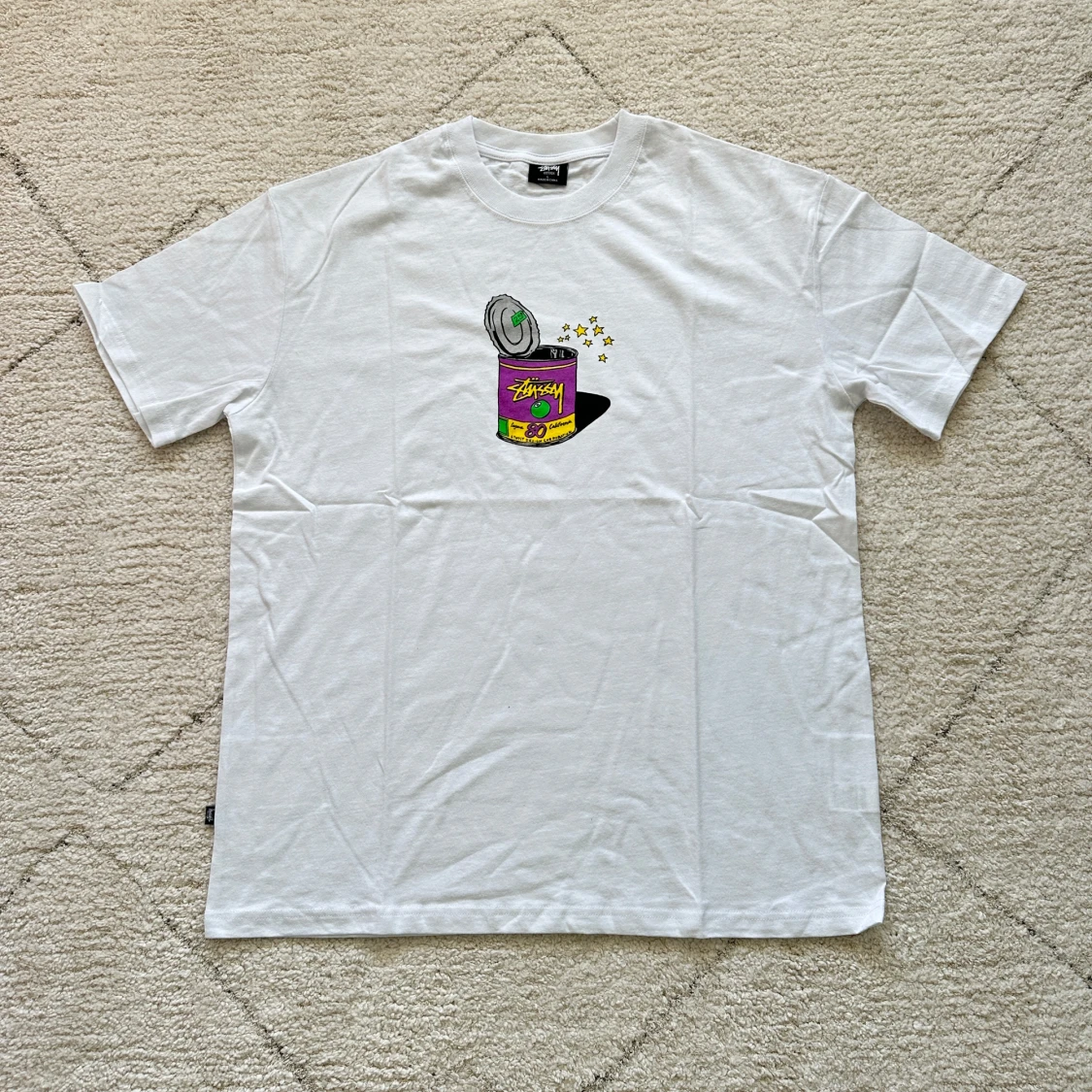 Vit t-shirt med Stüssy tryck