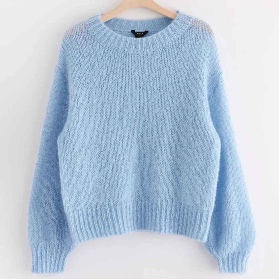 ljusblå stickad tröja