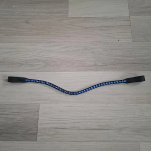 Globus Sport Pannband - Blått Pannband från Globus Sport strl Full, svart läderfärg. Aldrig använt.