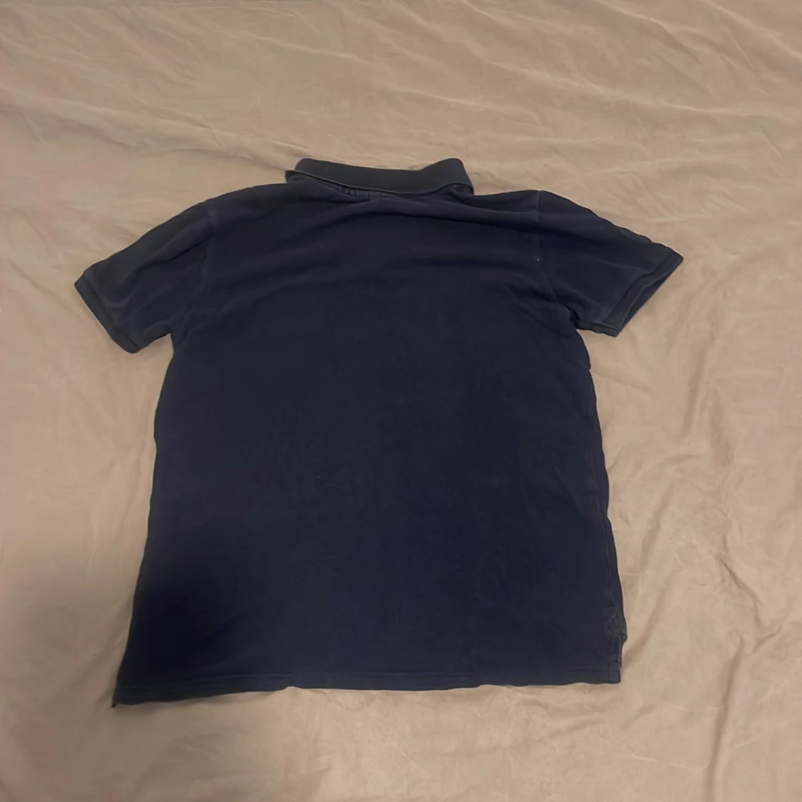 Mörkblå pikétröja från H&M - 1