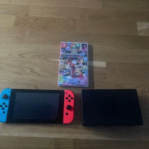 Nintendo switch - En Nintendo switch nästan aldrig använd, spel ingår även en Nintendo switch kontroll.