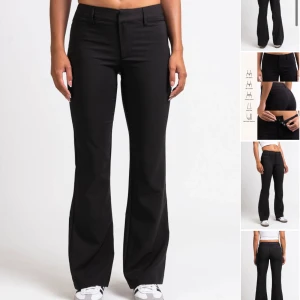Svarta Kostymbyxor bootcut - Snygga svarta bootcut byxor med låg midja och bälteshällor. Byxorna har ficklock och är slitna längst ner på byxbenen (bild 4).                                           https://madlady.se/lagmidjade-bootcut-kostymbyxor-drew-black