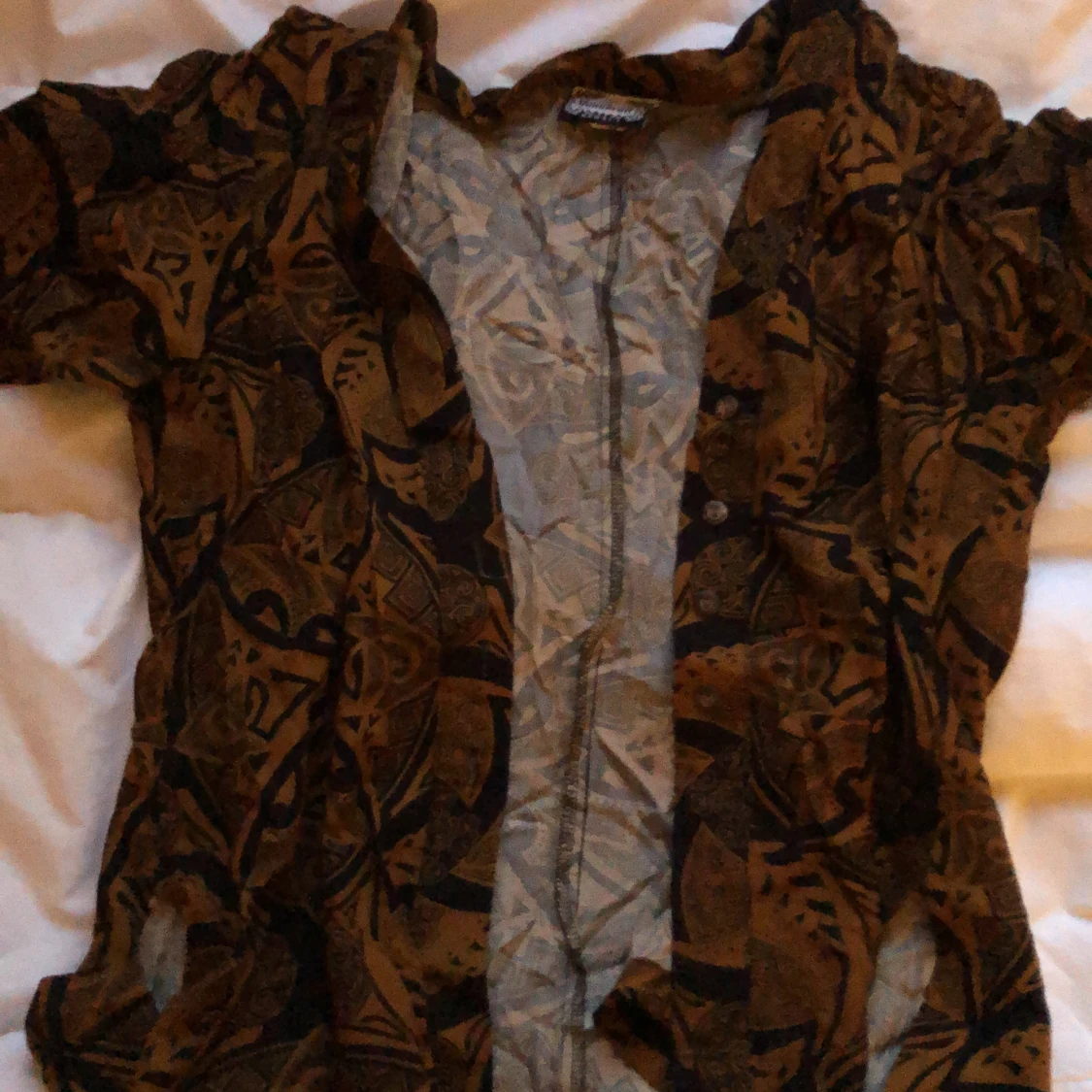 Mönstrad blus från Manuheali'i - 2