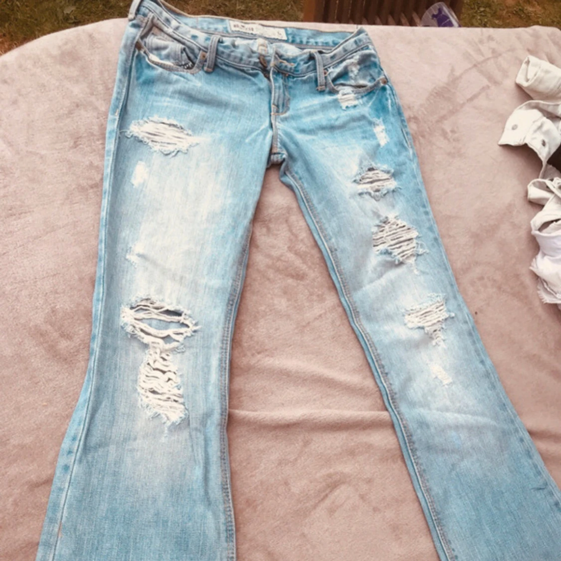 Lågmidjade slitna jeans från Hollister