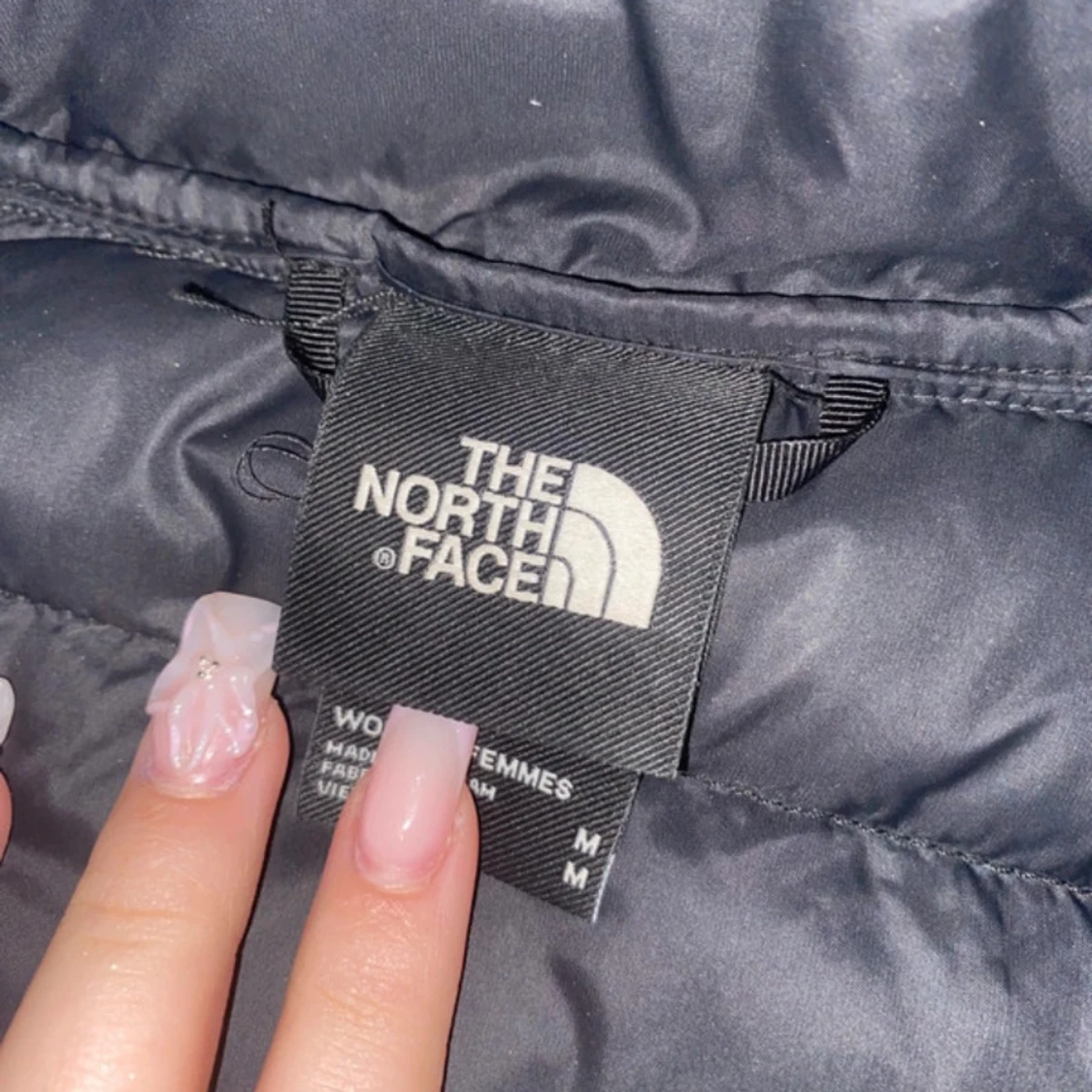 Svart dunjacka från The North Face M - 2