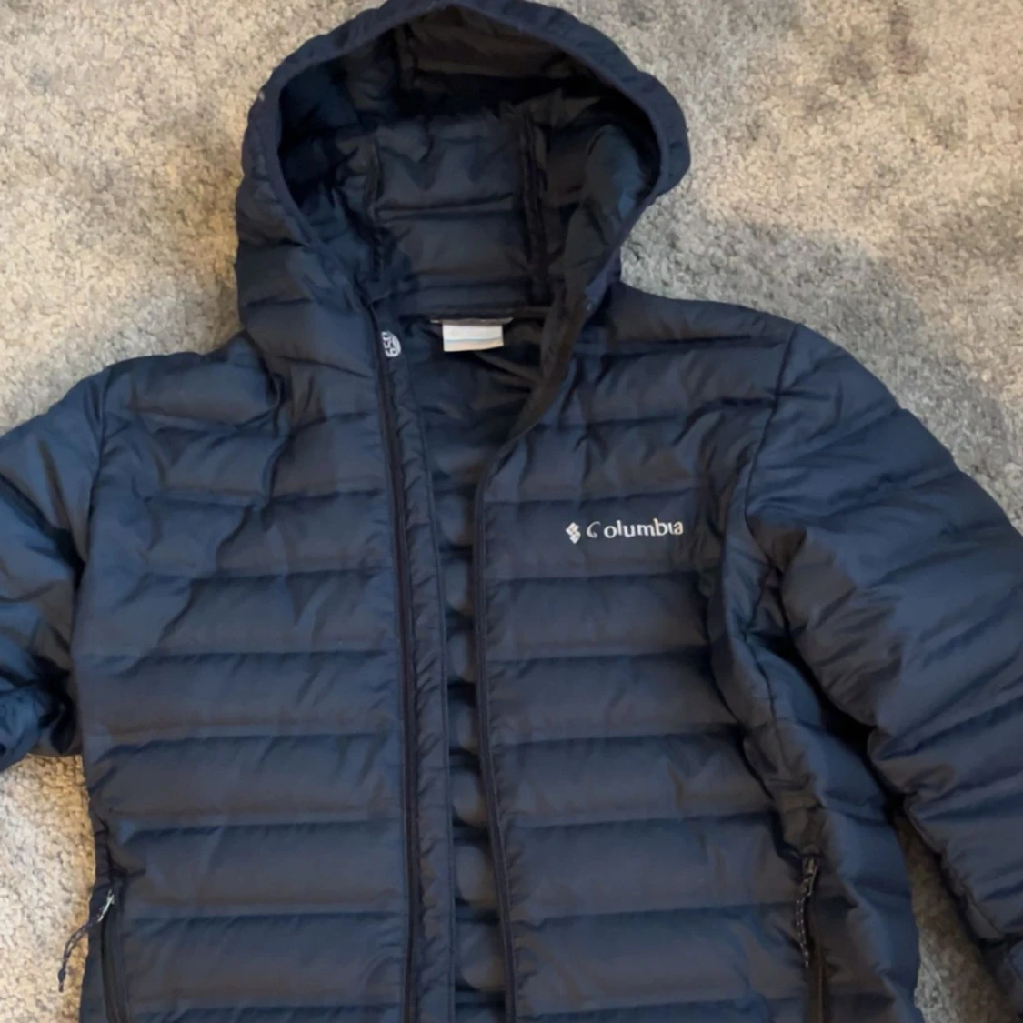 Mörkblå pufferjacka från Columbia