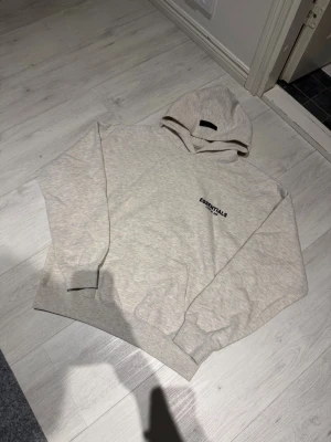 Essentials gray hoodie - Size M. New