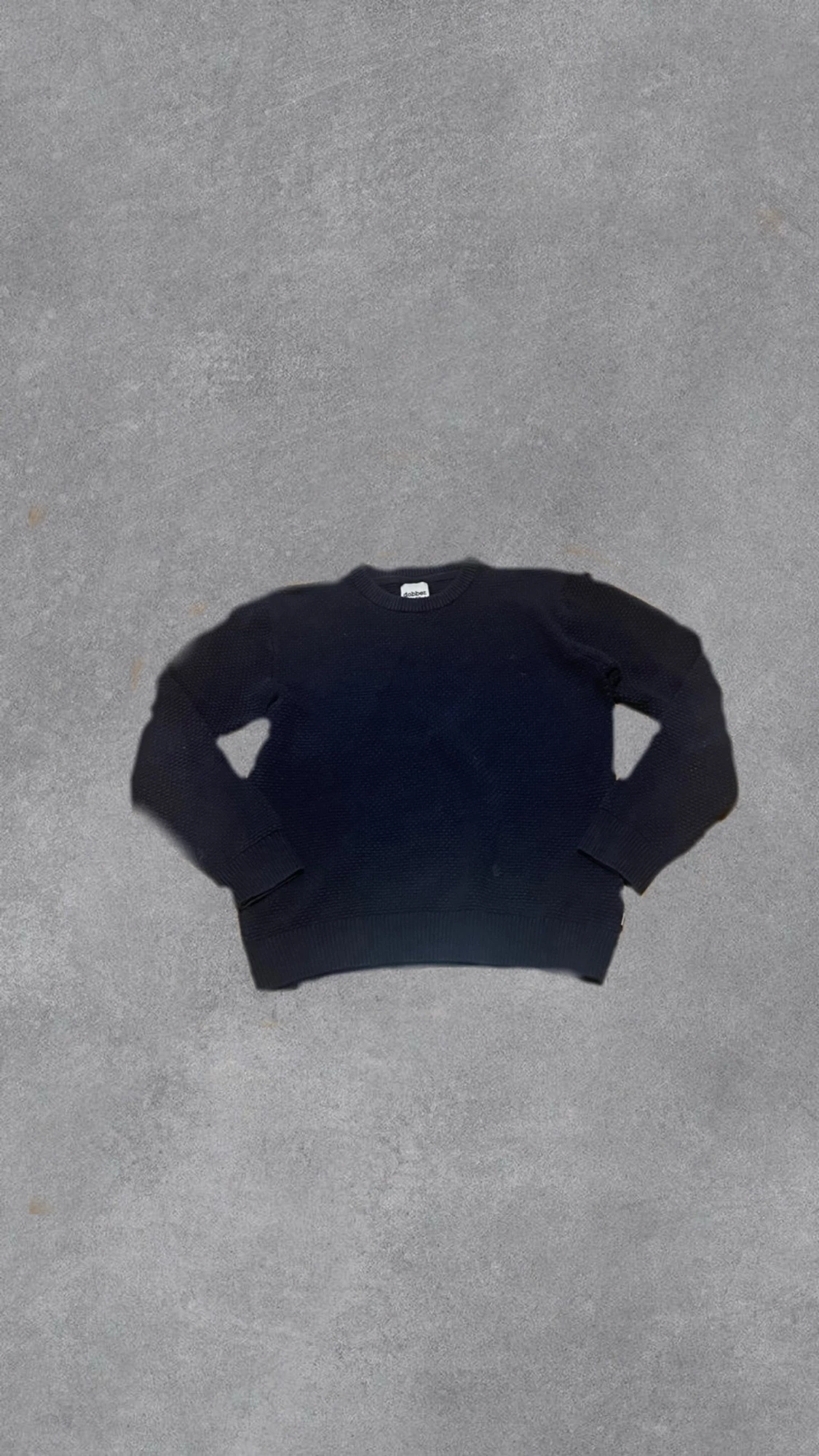 Mörkblå stickad tröja