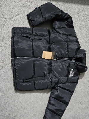 The North Face jacks - Svart the north face pufferjacka 