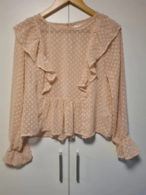 Ljusrosa tröja - Supersöt ljusrosa tröja i storlek S.