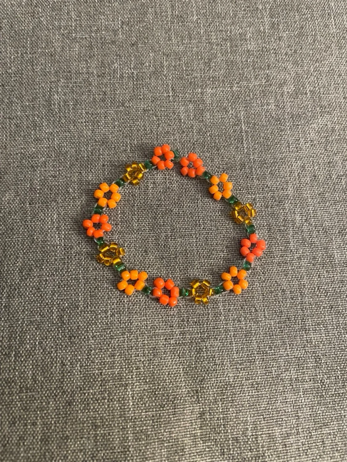  blommigt pärlarmband storlek S 