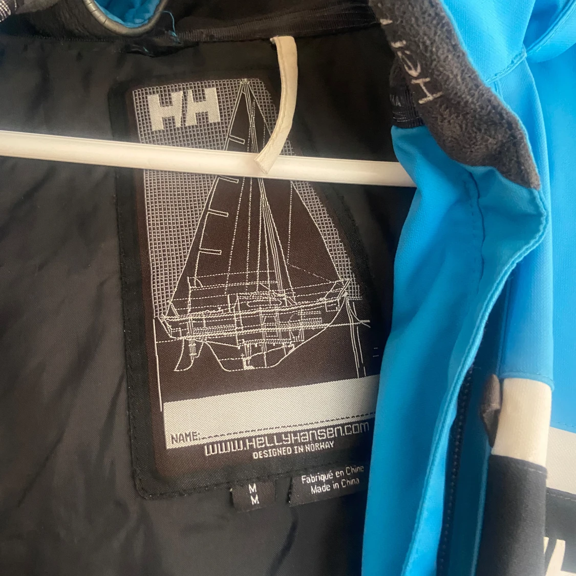 Blå vindjacka från Helly Hansen M - 1