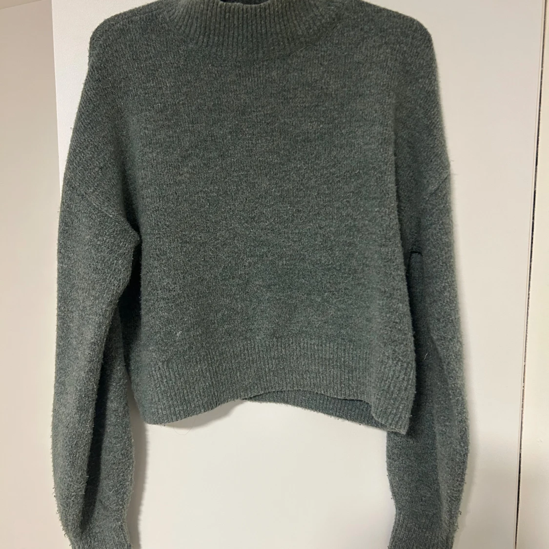 Grå stickad polotröja (Calvin Klein Jeans) strl S