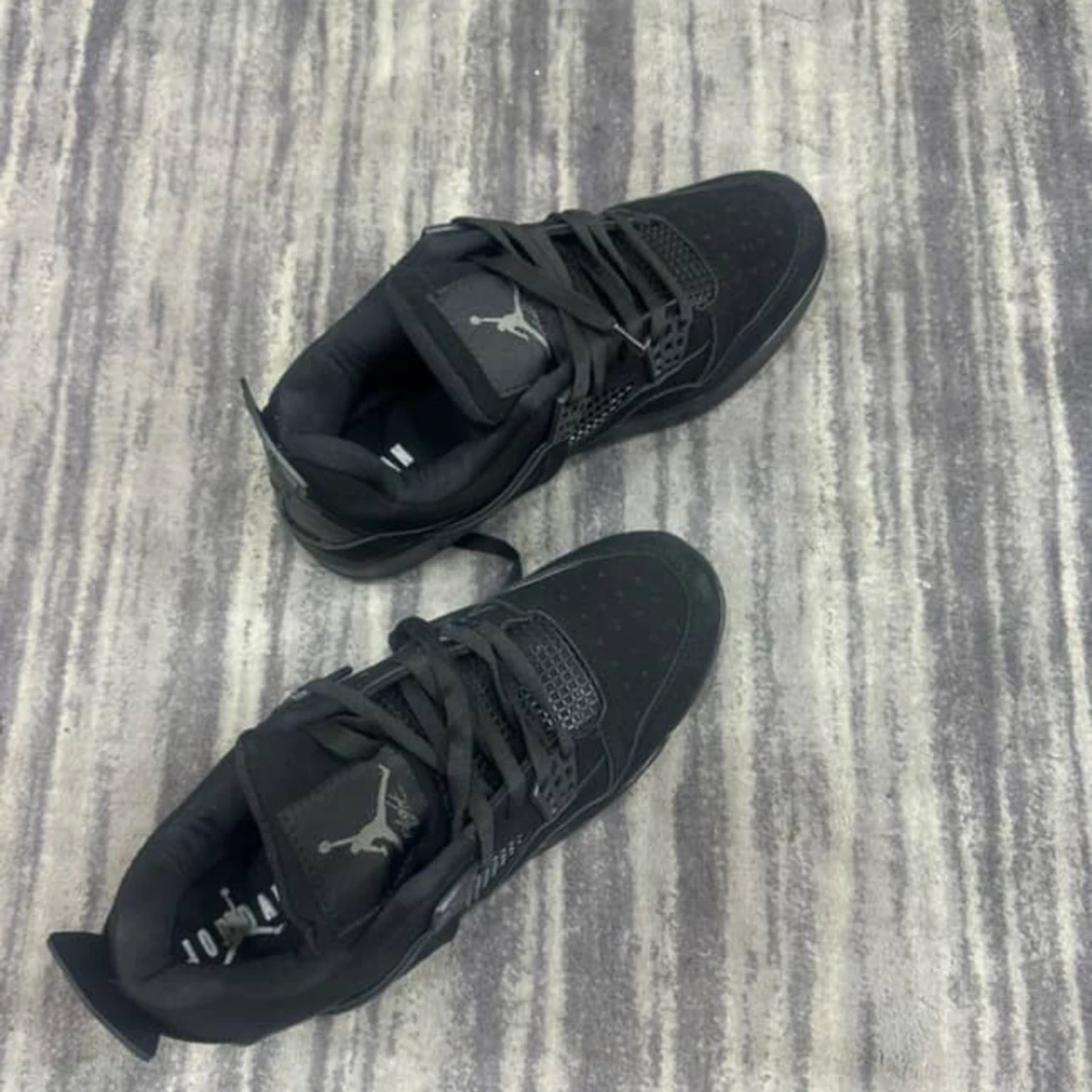 Svarta Nike Jordan 4 blac cat sneakers - 1